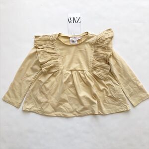 Zara NWT with flaw (small hold on side) ruffle shoulder long sleeve top 18-24m